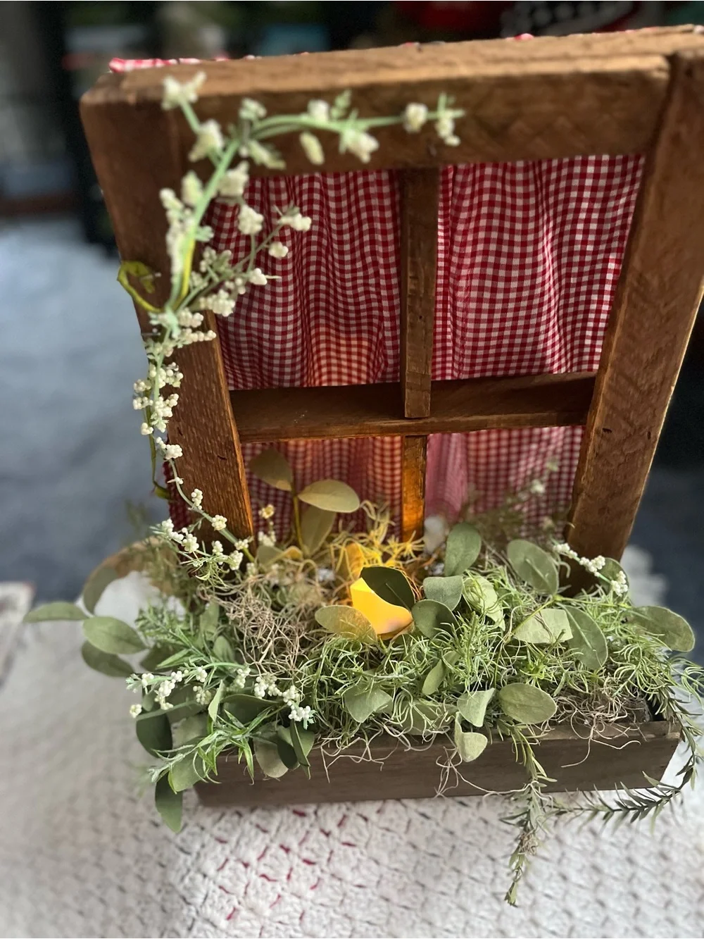 Rustic Windowbox Accent with Greenery and Soft Candle Light